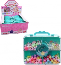 Perles dans une valisette pour enfants