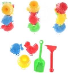 Set de sable avec pelle, râteau et moules