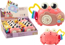 Crabe interactif rose avec projecteur et hochet à piles