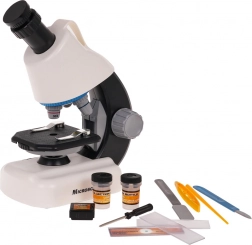 Microscope blanc avec accessoires