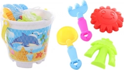 Set de sable avec seau, pelle, râteau et moules