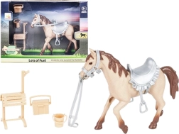 Poney dans l’écurie avec accessoires pour filles