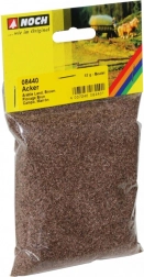 Matériau de saupoudrage brun