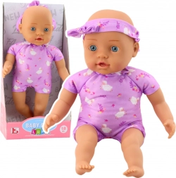 Poupée bébé en tissu 31 cm en body violet avec petit nœud