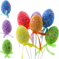 Oeufs de Pâques sur fil colorés avec motifs blancs et ruban, 6 pièces