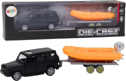 voiture tout-terrain noire avec remorque et bateau orange