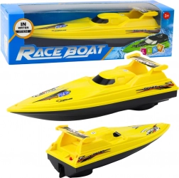 Bateau à moteur jaune sur batterie