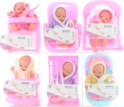 Bébé avec accessoires pour jouer