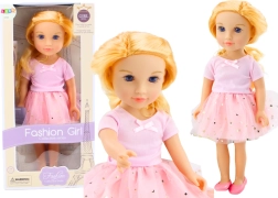 Poupée en robe rose avec jupe en tulle et cheveux blonds