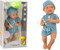 Poupée bébé en tenue bleue avec bonnet et tétine