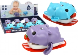 Jouet de bain à remontoir – hippopotame flottant sur planche