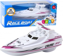 Bateau à moteur blanc à piles