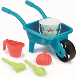 Brouette de jardin avec arrosoir et seau