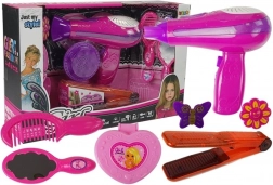 Ensemble de beauté avec accessoires sèche-cheveux et fer à lisser rose