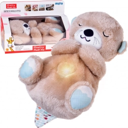 Loutre en peluche respirante avec lumière et berceuses pour bébés