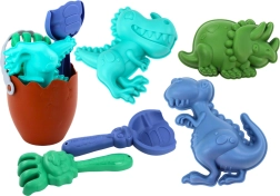 Set de sable dinosaures avec seau en forme d’œuf, pelle, râteau et moules