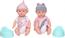 Bébé avec pot et biberon