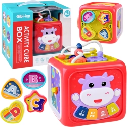 cube éducatif interactif avec piano, labyrinthe et trieur