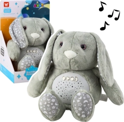 Lapin en peluche avec projecteur et berceuses