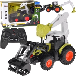 Tracteur télécommandé avec pelle rétro et chargeur