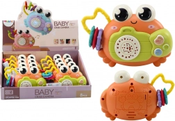 Crabe interactif avec hochet et projecteur, orange