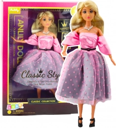 Poupée Anlily en robe rose claire à pois avec membres articulés