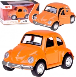 Voiture classique orange avec portes ouvrantes