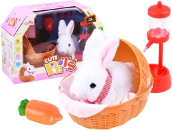 Lapin en peluche interactif dans un panier avec accessoires – Rose