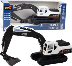 Grande excavatrice à chenilles avec godet en métal et articulations mobiles