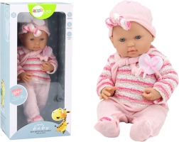 Poupée bébé en pull rayé rose avec bonnet et écharpe