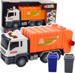 Camion poubelle avec lumières et sons, orange, 1:14