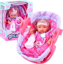 Poupée avec nacelle et accessoires