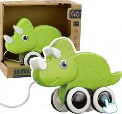 Dinosaure vert à tirer avec sifflet