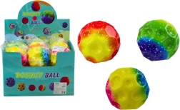 Balle lumineuse à malaxer avec alvéoles 9,5 cm colorée