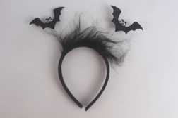 Serre-tête avec chauves-souris et plumes