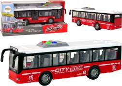 Autobus à piles avec entraînement à friction, lumières et sons 1:16 – Rouge