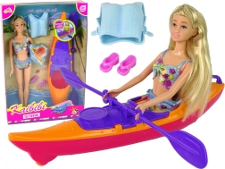 Ensemble poupée et kayak orange avec accessoires