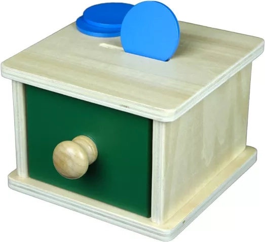 Insertion du jeton pour développer la motricité