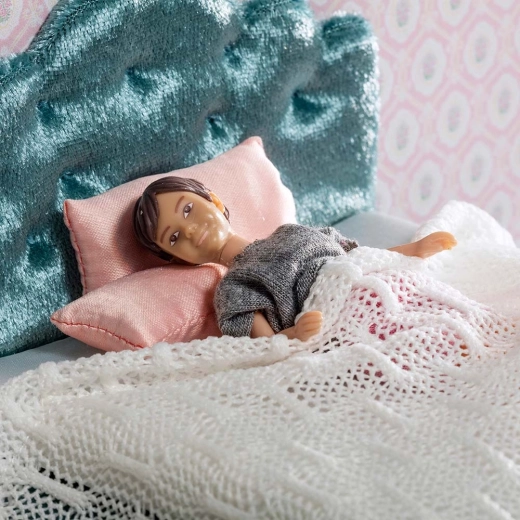 Confort pour les poupées dans un textile doux