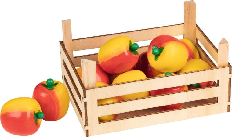 Pommes dans une caisse en bois