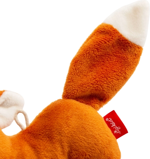 Peluche douce et détails brodés, respectueux de bébé