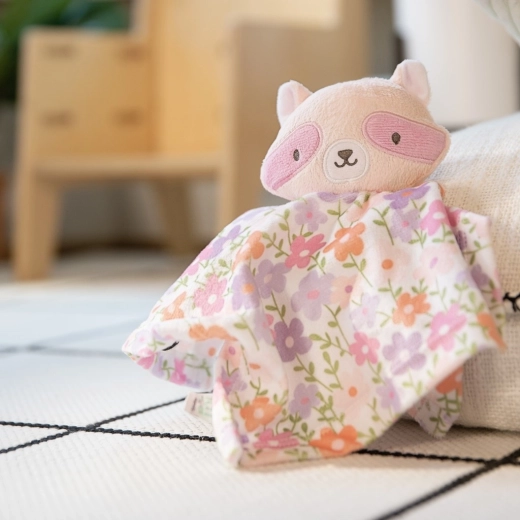 Un design craquant avec le raton laveur Deni