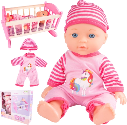 Poupée bébé avec berceau