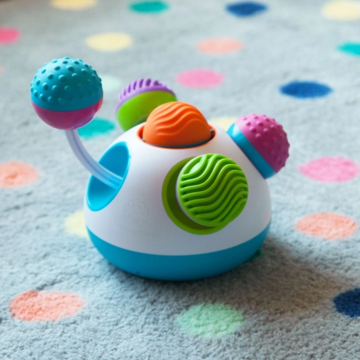 Boutons souples et élément rotatif