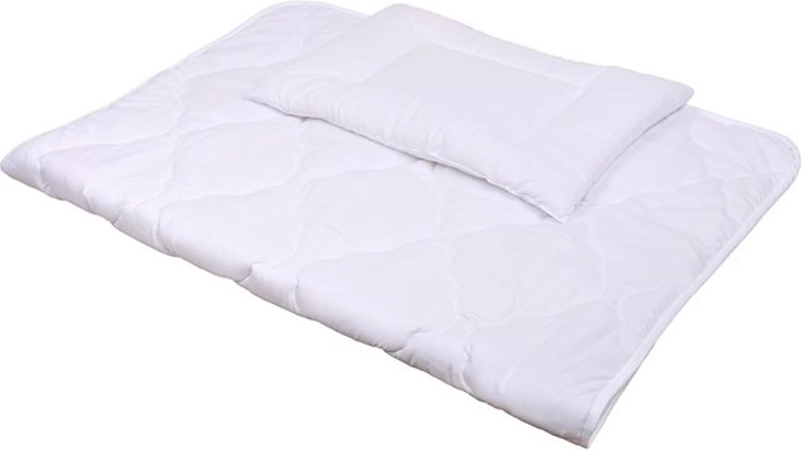 Couette et oreiller matelassés pour un confort optimal