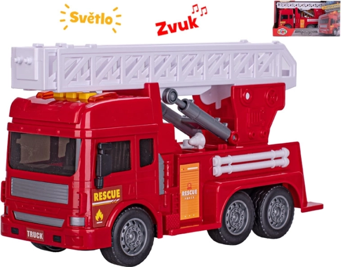 Camion de pompiers avec échelle extensible, lumière et son – 28 cm
