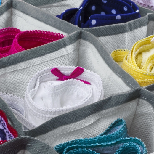 Boîte de rangement textile grise avec 8 poches