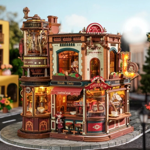 Café détaillé avec façade marquée et enseignes lumineuses