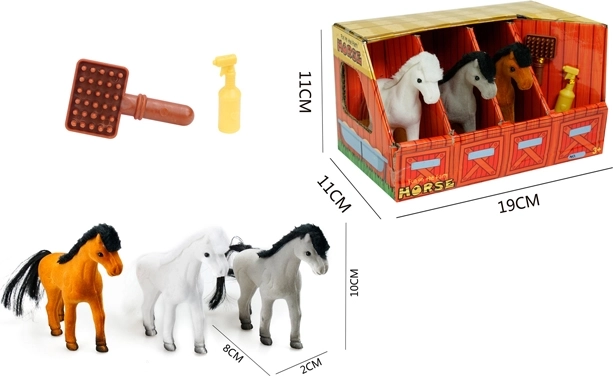 Trois poneys dans l’écurie avec accessoires
