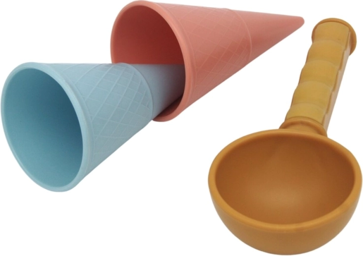Amusement dans le sable : seau, tamis et cornets “glace”